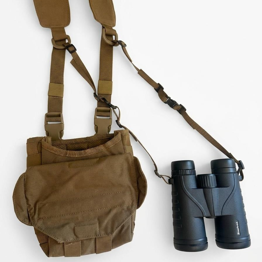 Binoculars tethered to a Lone Trail bino harness