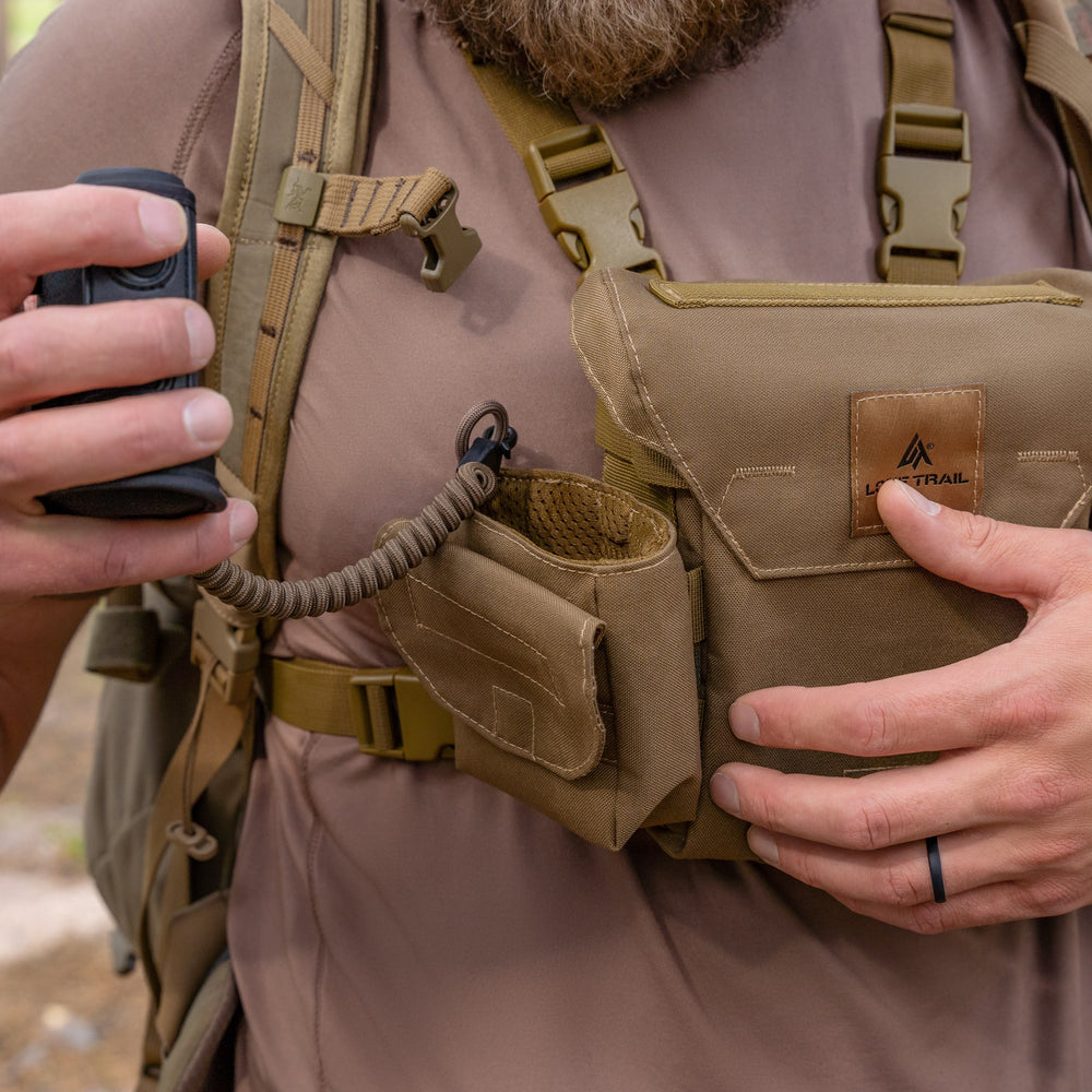 Rangefinder on the tether, clipped to the bino harness