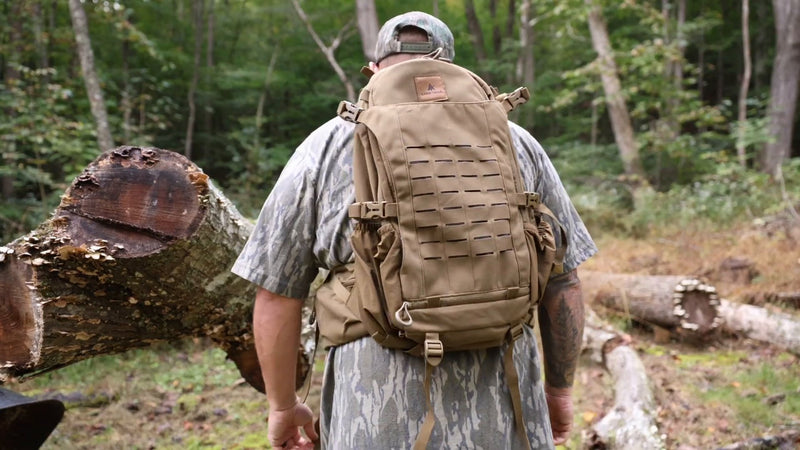 Josh from The High Life TV wearing the Lone Trail SB1 25L hunting backpack in the woods