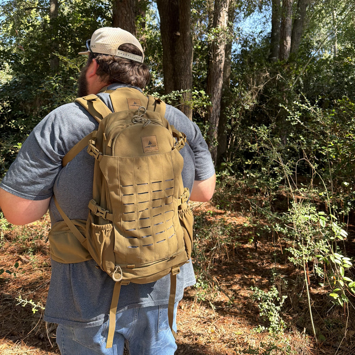 Hunter wearing the Lone Trail SB1 25L hunting backpack in the woods
